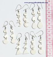 White carved earrings
