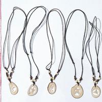 Carved tagua necklaces