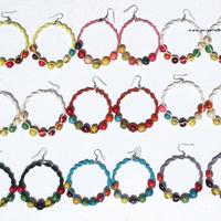 Round earrings with seeds