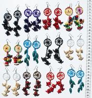 Spider net and seed earrings