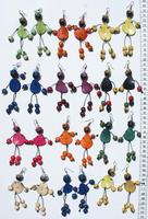 Tagua earrings with human shape
