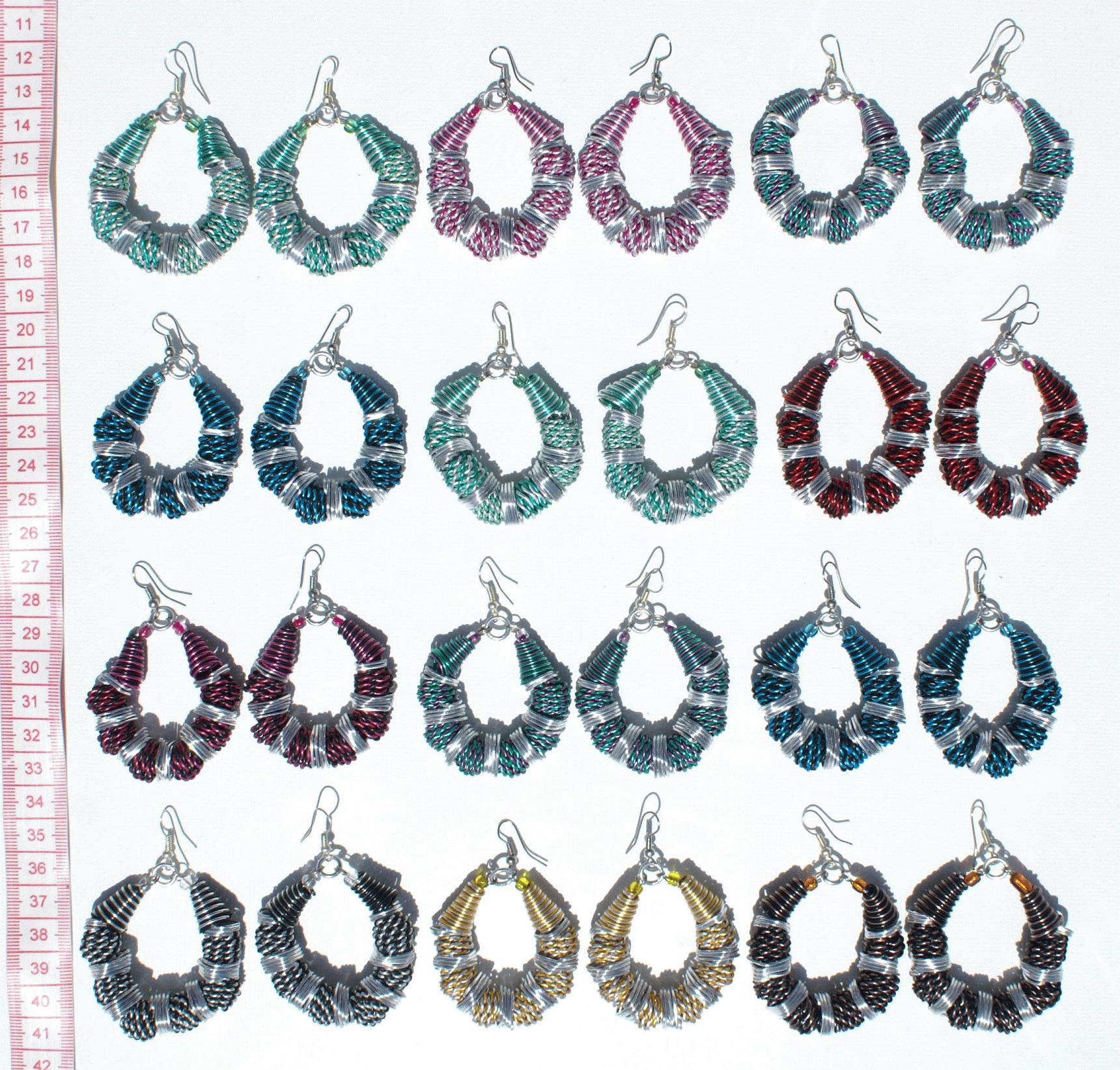 Longues boucles d'oreilles orientales avec pierres en œil de tigre